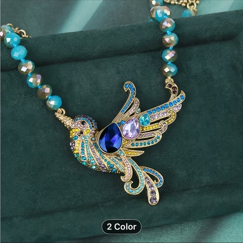 Elegant Gold and Blue Crystal Bird Necklace